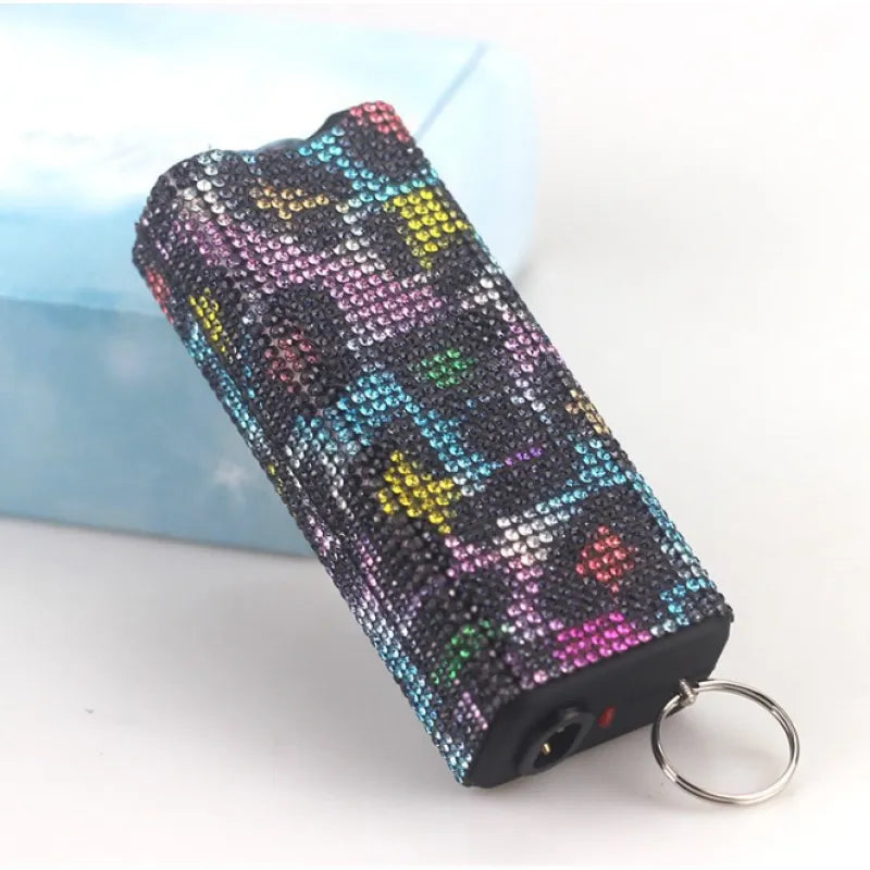 Luxe Stun Gun Keychain – Elegant Self-Defense with LED Light (18+)